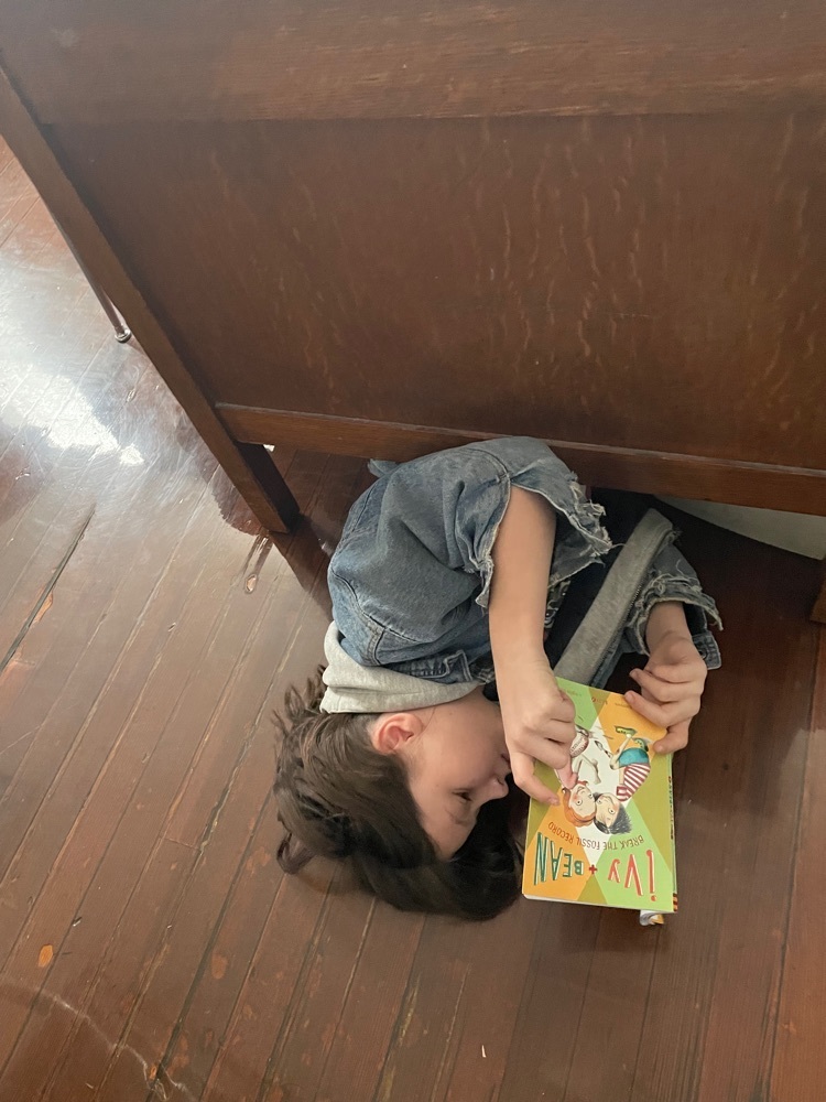 DEAR Day in 3rd/4th grade…they love to find interesting places to enjoy their books!